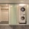 Large well lit laundry area with full size washer and dryer and large closet space