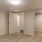 Spacious and well lit bedroom with a large closet