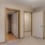 Large well lit bedroom with spacious closet 